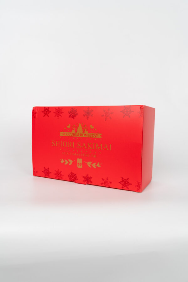 Red gift box with snowflake pattern and Shiori Sakimai text, festive design for collectible figure packaging